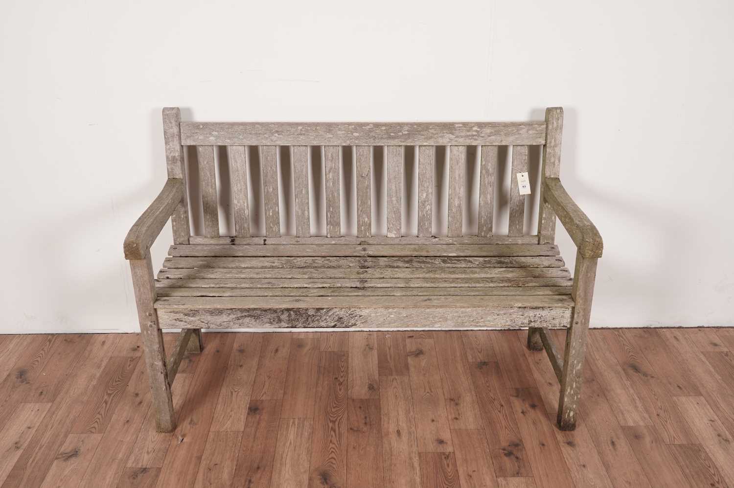 A modern teak garden bench - Image 2 of 3