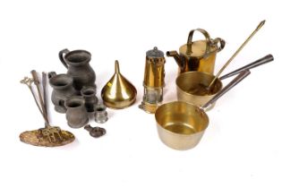 A selection of brass and pewter ware