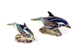 Two Royal Crown Derby limited edition 'Lyme Bay Dolphin' paperweights