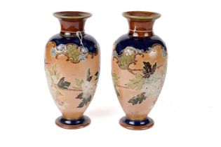 A pair of early 20th Century Royal Doulton stoneware vases