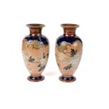 A pair of early 20th Century Royal Doulton stoneware vases