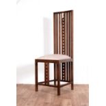 A modern mahogany hall chair in the style of Charles Rennie Mackintosh