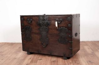 A 20th Century Chinese hardwood and metal bound chest