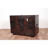 A 20th Century Chinese hardwood and metal bound chest