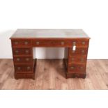 A Victorian mahogany pedestal desk