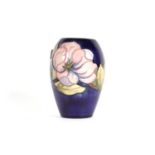 A Moorcroft ‘Magnolia’ pattern vase