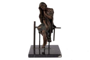 A bronzed cast resin sculpture