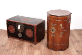 A modern Asian octagonal two-handled cabinet and a blanket box.