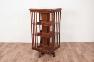 A three tier walnut revolving bookcase, c1900