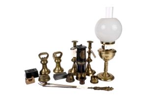 A 19th Century brass oil lamp and other brass collectibles