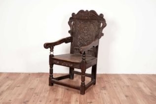 A Victorian oak wainscot chair