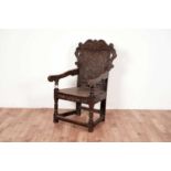 A Victorian oak wainscot chair