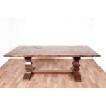 A substantial hardwood refectory dining table