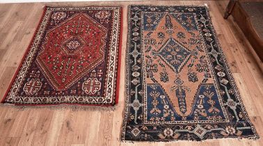 A Hamadan rug and Persian style rug