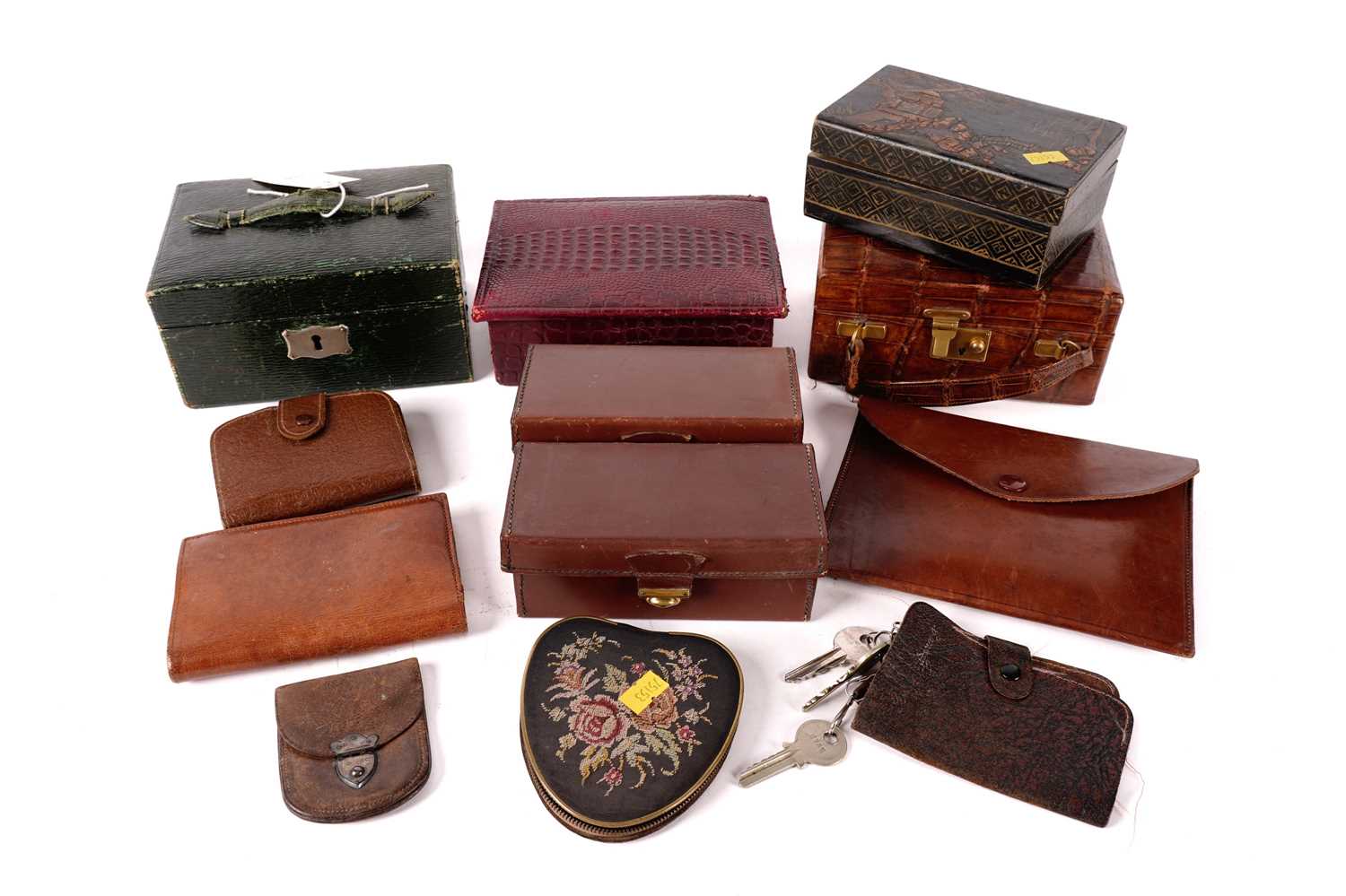 A collection of vintage jewellery boxes, purses, and other small cases