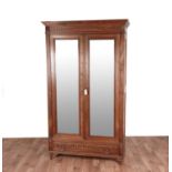 A 20th Century French walnut armoire