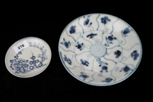 A Treasure of Tek Sing ‘Lotus’ pattern blue and white dish and bowl