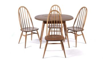 Ercol: A retro model 396 all-purpose table with a set of four model 365 Quaker dining chairs