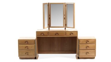 Ercol: A late 20th Century beech and elm bedroom suite