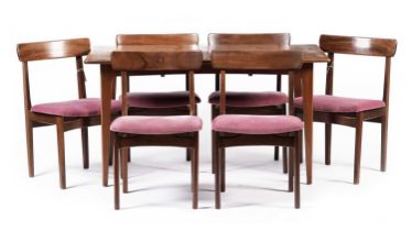 A retro teak extending dining table and six chairs