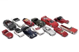 A selection of diecast model sports cars and other vehicles