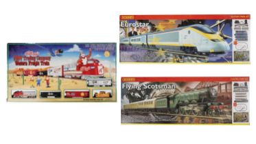 Hornby Flying Scotsman and Eurostar electric train sets, and another electric train set