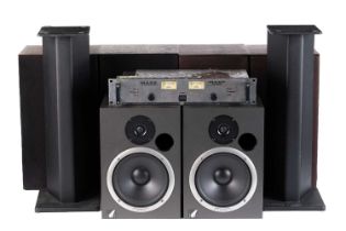 Three pairs of monitor speakers and a stereo amplifier