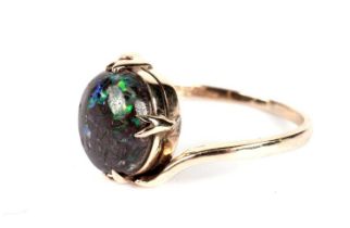 A black boulder opal ring