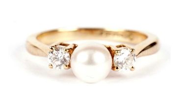 A cultured pearl and diamond ring