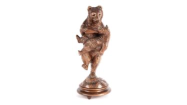 An early 20th Century carved Black Forest bear figure group