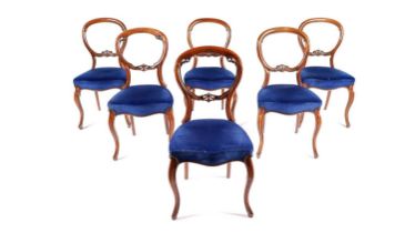 A set of six Victorian mahogany balloon back chairs