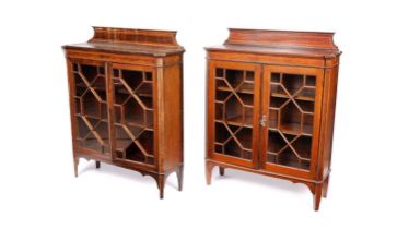 Two near-matching Edwardian satinwood and mahogany glazed bookcases
