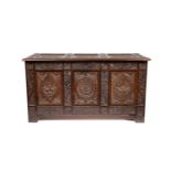 A substantial carved oak three-panel coffer, 19th Century