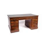 A Victorian mahogany pedestal writing desk