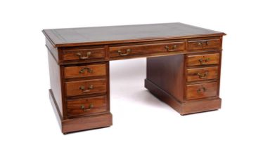 A Victorian mahogany pedestal writing desk