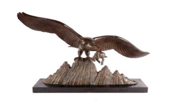 A large bronze figure of an eagle with prey, by Lucien Gibert