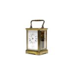 A late 19th Century French brass carriage alarm clock