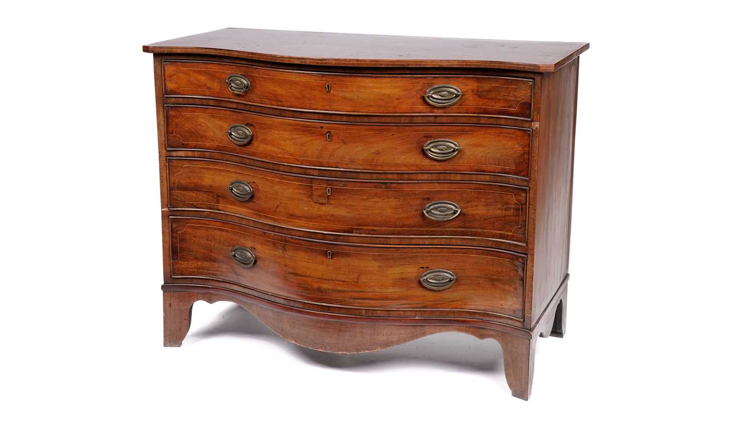 A George III mahogany serpentine-fronted chest of drawers