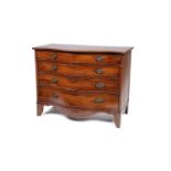 A George III mahogany serpentine-fronted chest of drawers