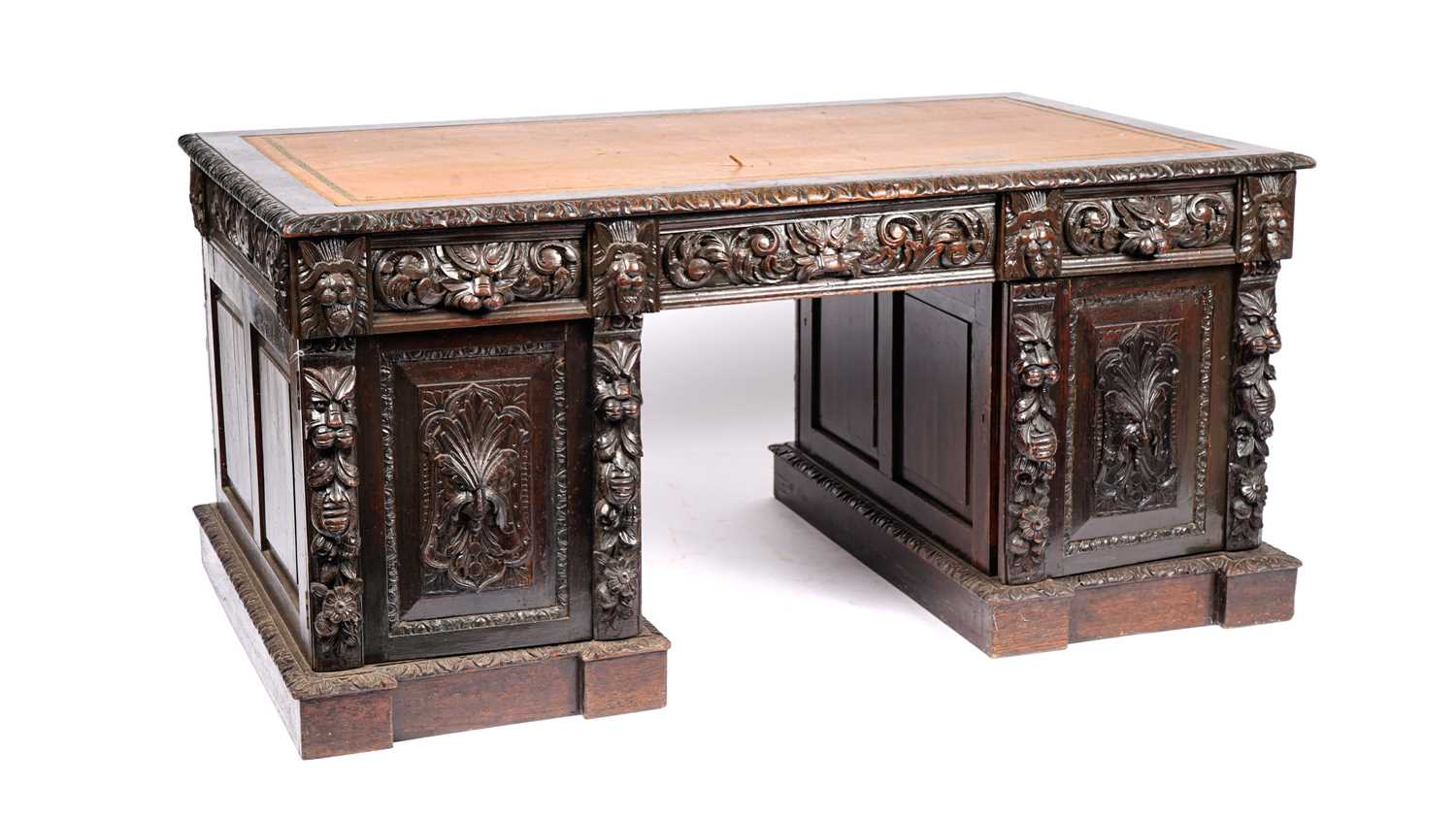 A Victorian oak pedestal partners desk
