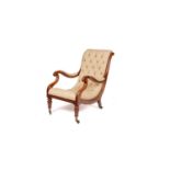 A George IV oak button back library chair