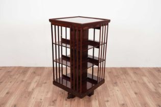 An early 20th century mahogany revolving bookcase