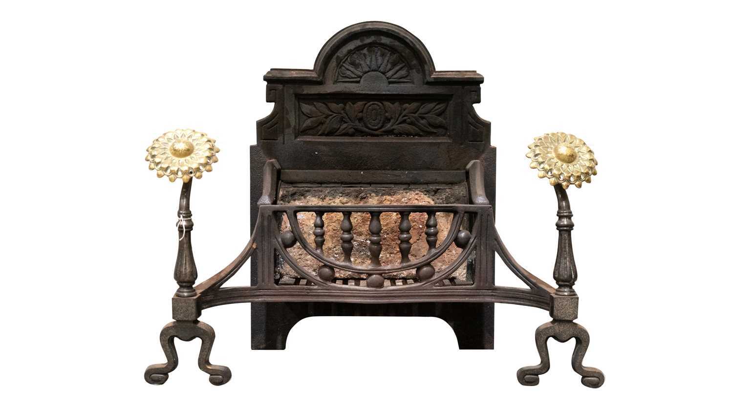 A cast iron firegrate incorporating a pair of fire dogs
