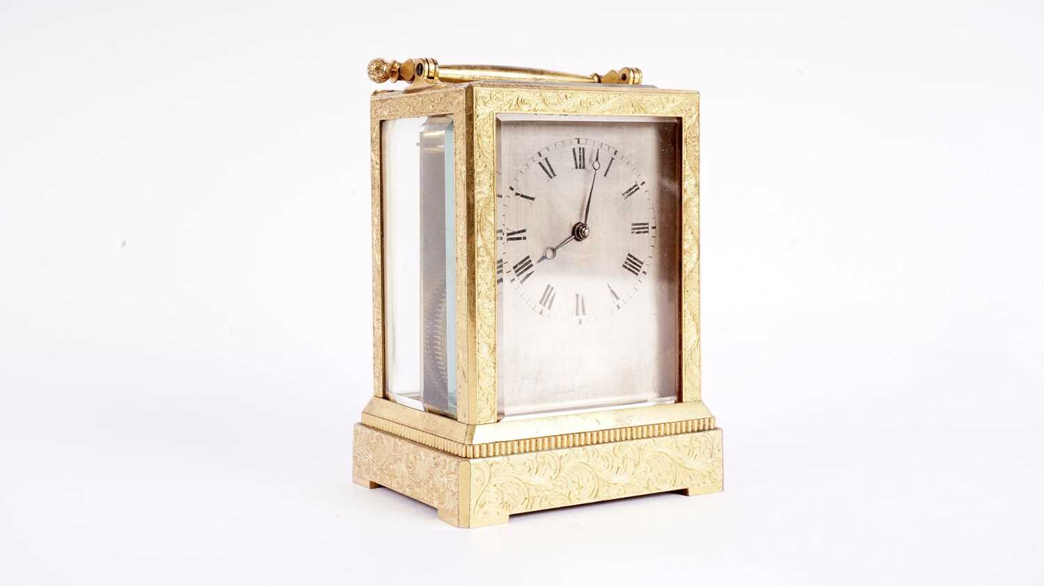 Vieyres of London: A late 19th Century engraved and gilt brass carriage clock