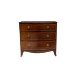 A George III inlaid mahogany bowfront chest of drawers