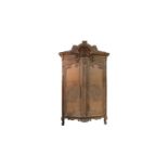 A large and impressive French provincial style carved light oak armoire