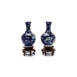 Pair of Chinese prunus blossom vases and stands