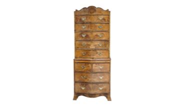 A burr walnut and walnut serpentine chest on chest, late 19th/20th Century