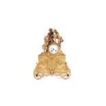 An ornate 19th Century French gilt metal mantel clock