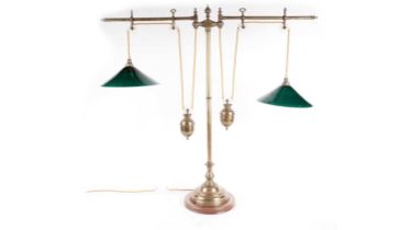 A vintage brass twin rise and fall pulley lamp